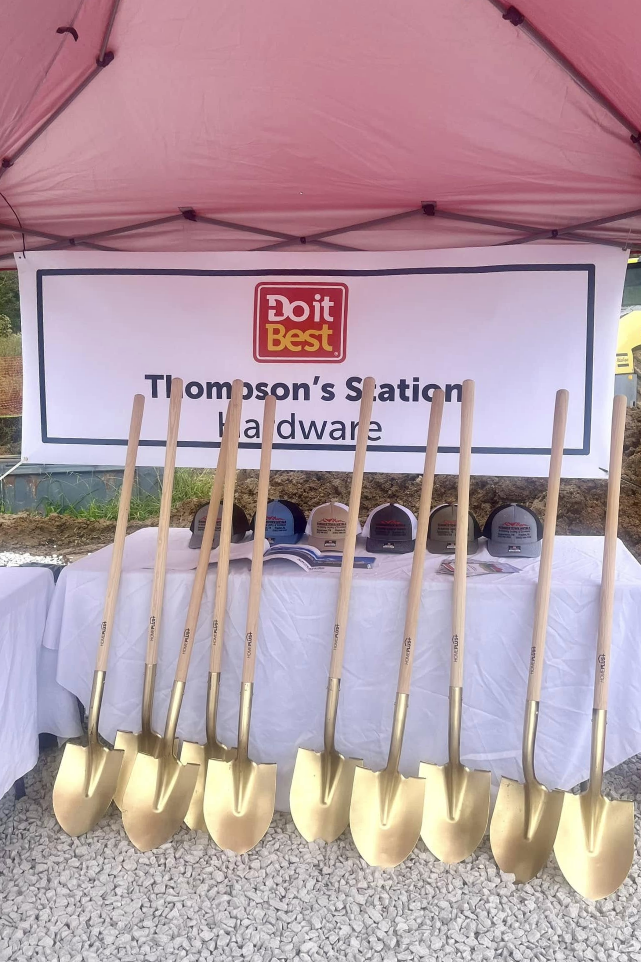 Golden ceremonial shovels used in the official groundbreaking ceremony for Thompson's Station Hardware construction project